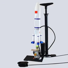 Water rocket launcher set with stand and pump for backyard launches and summer holiday activities.