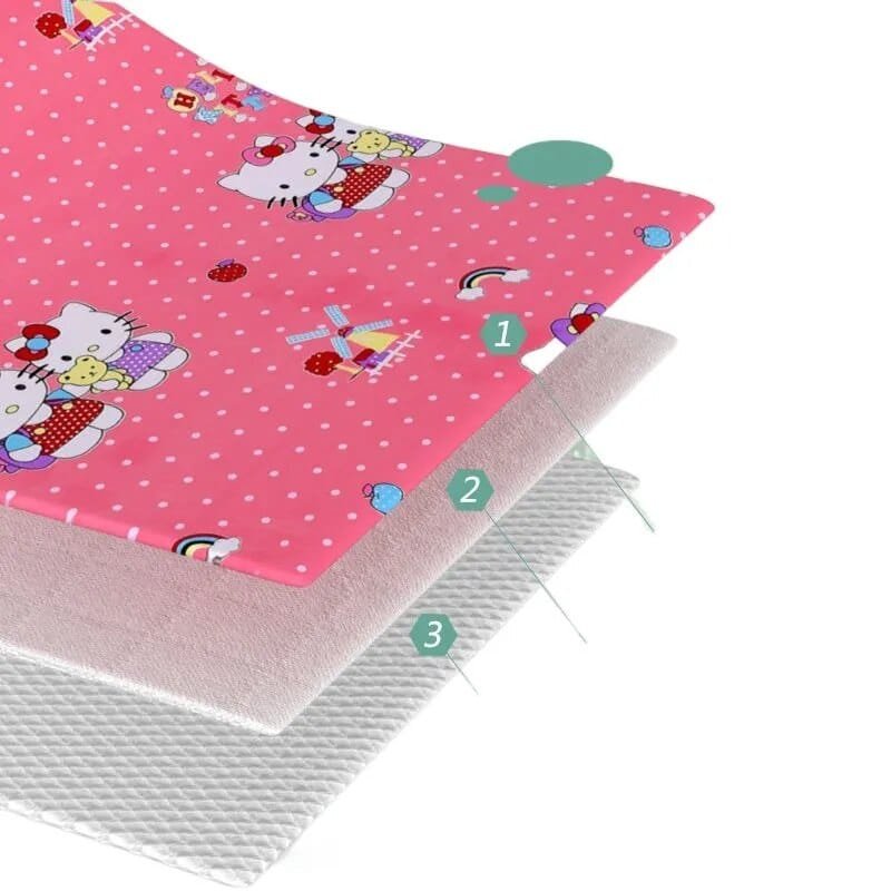 Pink fabric with cartoon characters and a gray mesh layer underneath