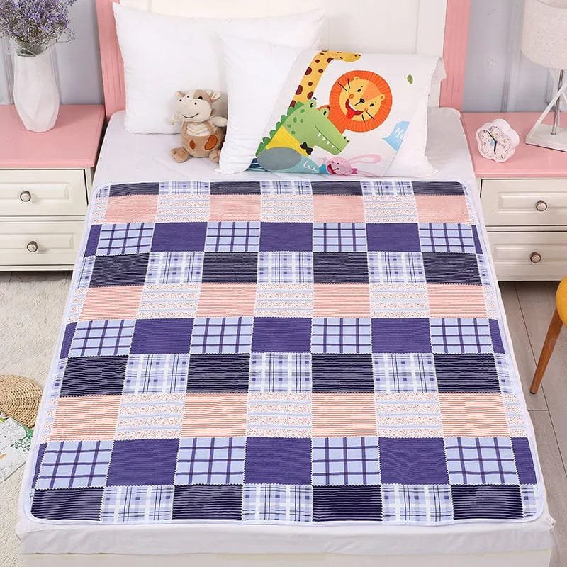Checkered quilt on a bed with children's toys and decor in the background