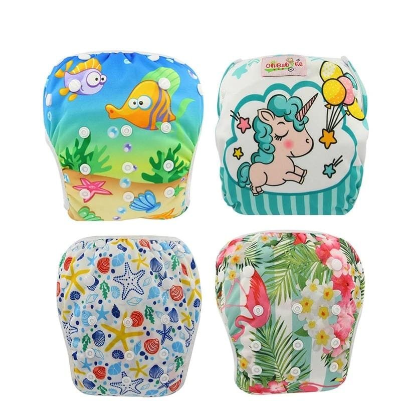 Waterproof baby swim diaper pants in four prints, reusable adjustable swim nappies for pool trips and beach days.