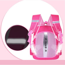 Pink backpack with reflective elements.