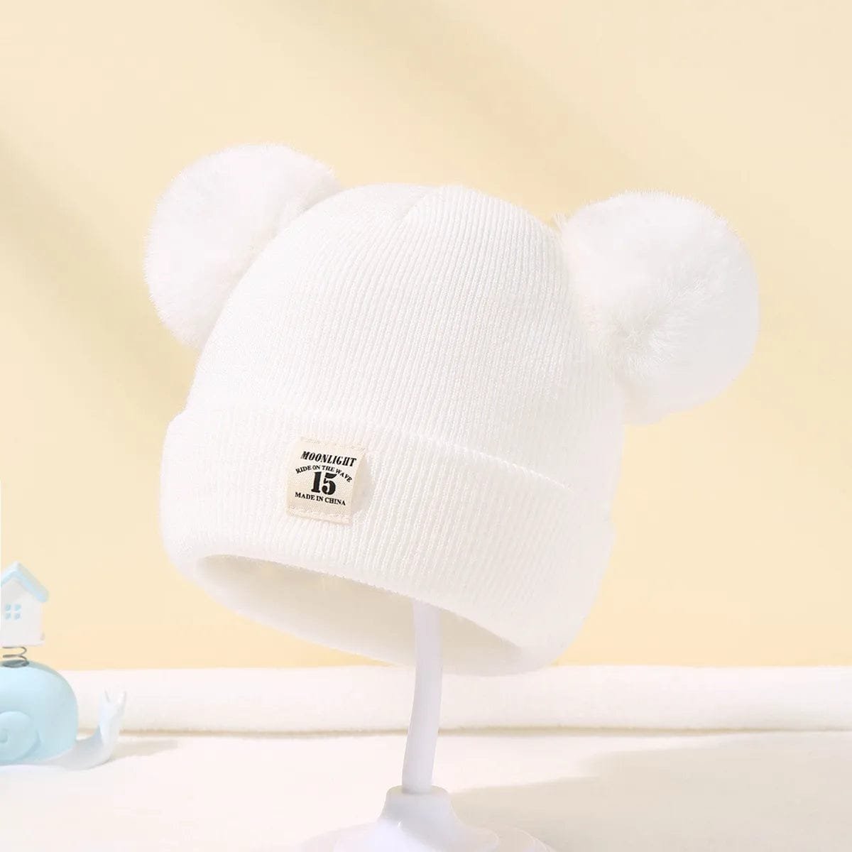 White Warm Knitted Baby Beanie from another angle for gentle winter warmth and cute newborn gifting.