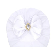 Shiny Rhinestone Bowknot Baby Turban in white with decorative bow for christenings and photo days.