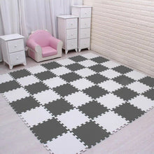White and gray EVA foam puzzle mat offering a soft floor surface for baby play.