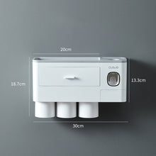 White inverted toothbrush holder with magnetic wall mount sizing for neat bathroom storage.