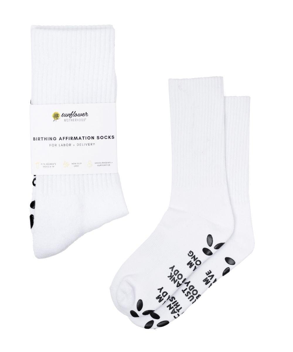White labor and delivery affirmation socks with bold black text for hospital bag essentials.