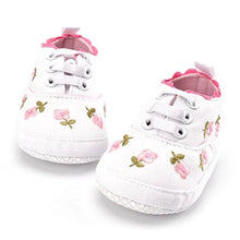 Side profile of the white lace floral baby girl prewalker shoes, lightweight crib shoes for daily wear and stroller outings.