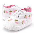 White lace floral baby girl shoes, soft-soled prewalkers for newborn first steps, christenings, and dressy family occasions.