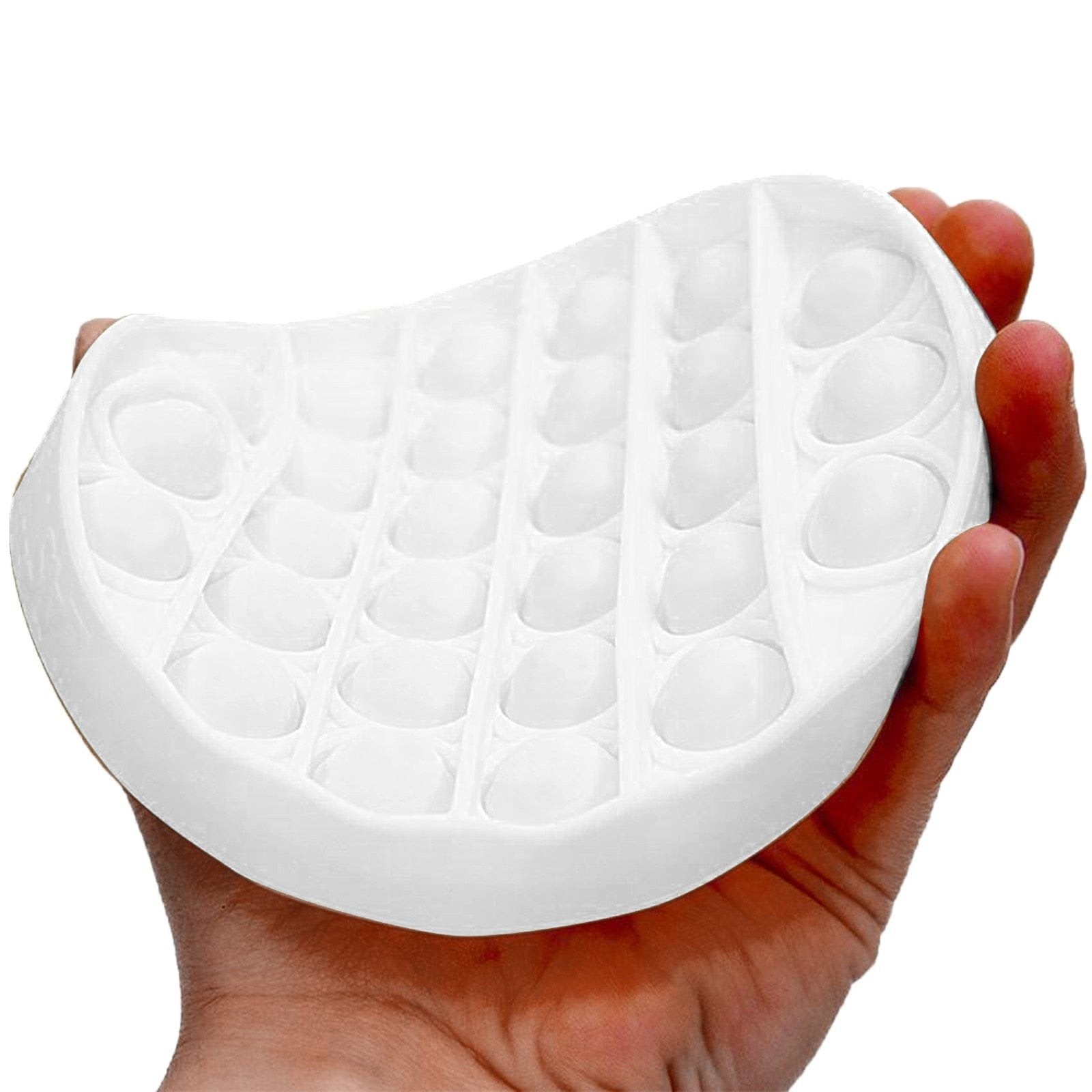 White push pop silicone mold with a textured surface shown in hand for sensory play.