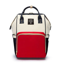 White, red, and black diaper bag styled for mommy and baby large capacity daily carrying.