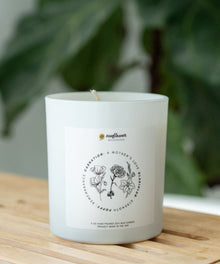 White Remembrance Healing Candle with floral label for grief support, remembrance ceremonies, and soothing bedside light.