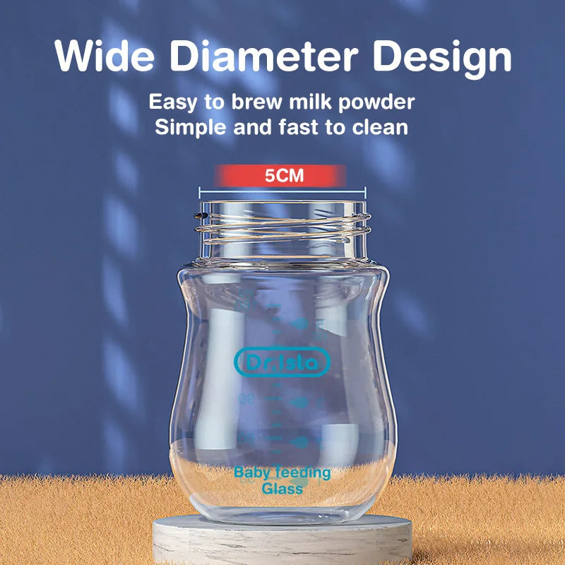 Anti-colic vent system detail on the wide-neck glass baby bottle for reducing swallowed air during feeds.