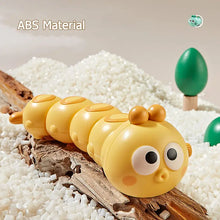 Yellow wind-up caterpillar toy with an ABS material callout