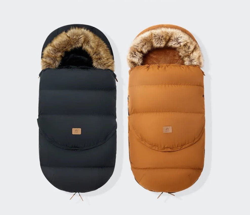 Winter baby stroller sleeping bag in black and brown with fur trim, a warm footmuff for pram walks in cold weather.