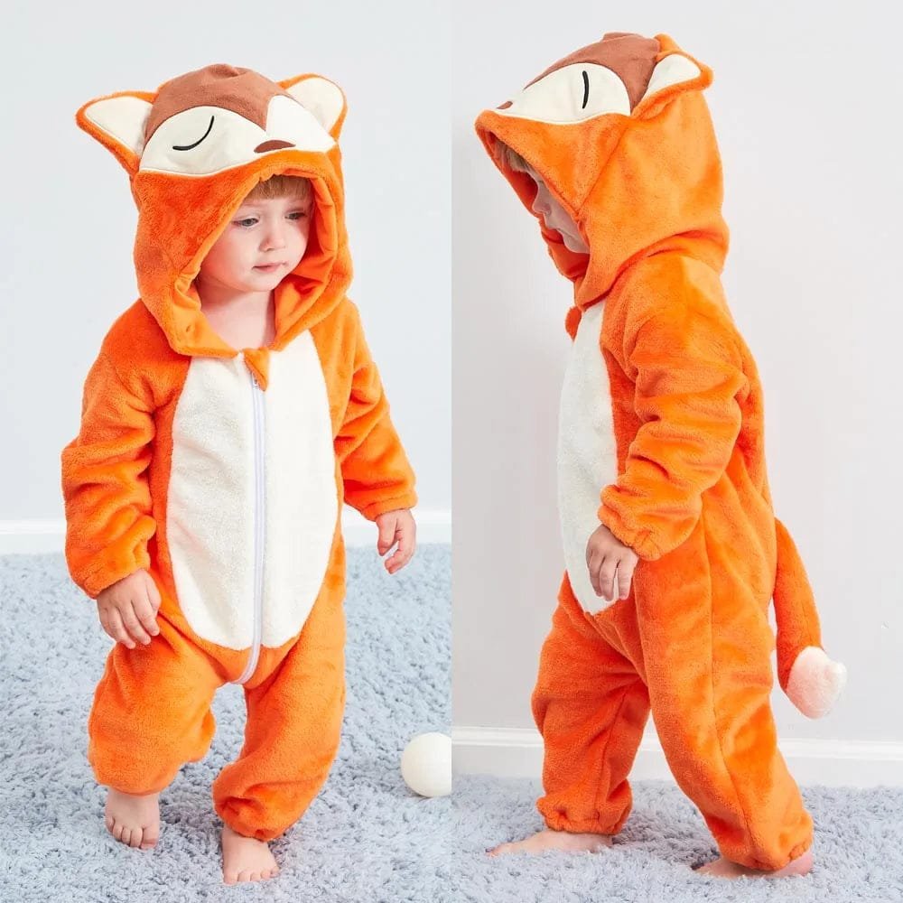 Toddler in the orange fox winter flannel romper, a hooded onesie for chilly mornings and cosy indoor play.