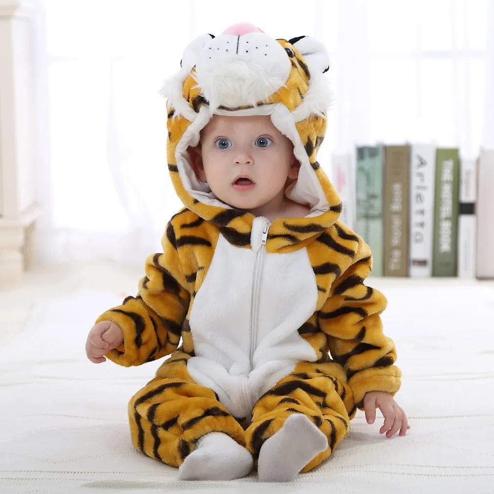 Baby in the winter flannel tiger romper, a hooded onesie for warm floor play and cold-weather lounging at home.
