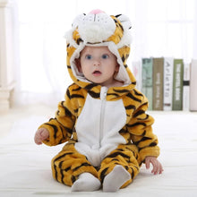 Baby in the winter flannel tiger romper, a hooded onesie for warm floor play and cold-weather lounging at home.