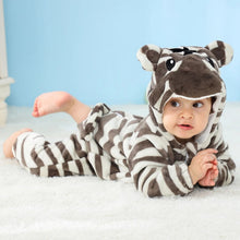 Baby wearing the zebra winter flannel romper with hood, a warm one-piece for nursery days and winter naps.