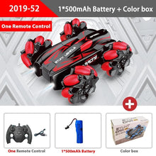 Red variant of the WLtoys F1 drift RC car with remote and battery, a gesture-control toy for indoor stunt play.