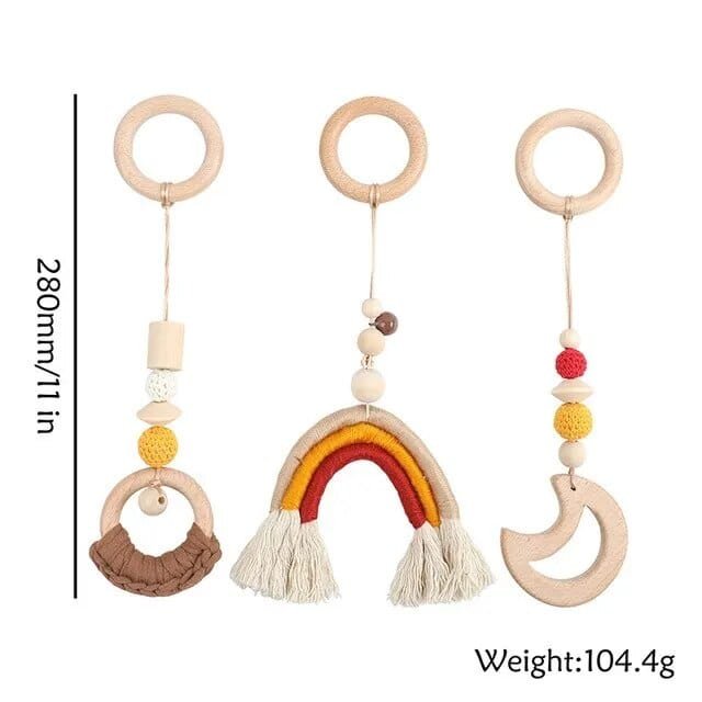 Colorful baby teething toy with wooden rings and rainbow design on a white background