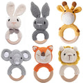 Full collection of wooden baby rattle and teether rings with crochet animal designs, soothing toys for teething infants.