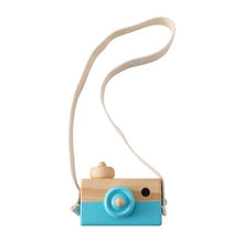 Wooden camera pendant with blue base and beige top, a Montessori role play toy for toddlers exploring make-believe.