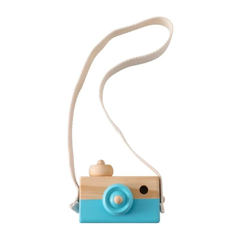 Side view of the blue and beige wooden camera pendant, a pretend play toy for imaginative outdoor adventures.