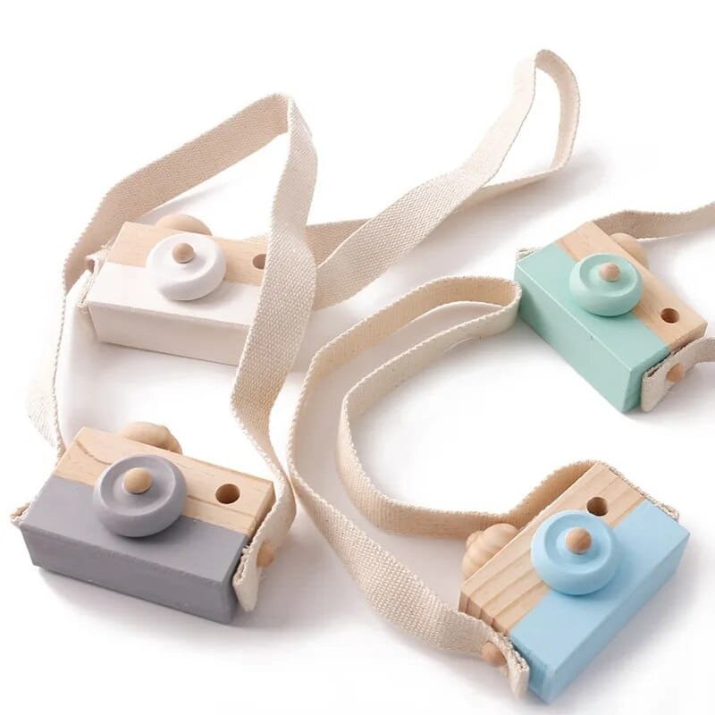 Set of wooden camera pendants with straps in multiple colours, handmade Montessori toys for gifting and pretend play.