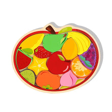 Round wooden fruit jigsaw puzzle with an apple and other colorful fruit pieces