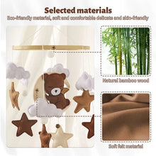 Bear and cloud felt crib mobile made with natural bamboo wood, a gentle hanging toy for newborn visual stimulation.