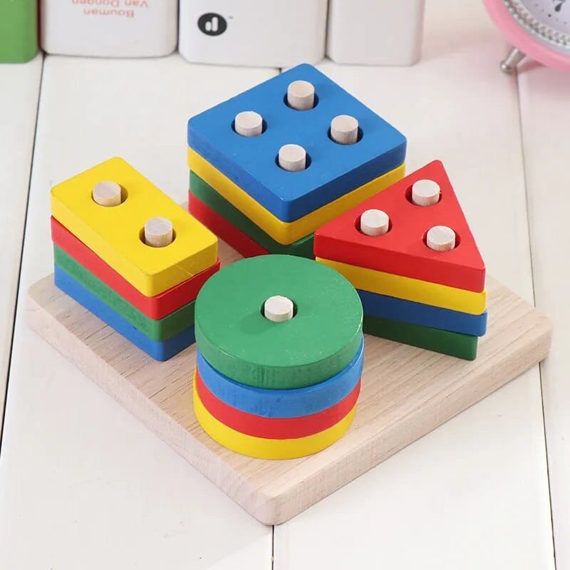 Colourful geometric wooden shape puzzle, a Montessori learning toy for babies exploring forms and hand control.
