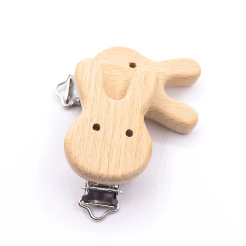 Wooden guitar shaped pacifier clip, a smooth teether dummy holder for attaching soothers to clothing during stroller walks.