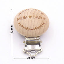 Wooden pacifier clip with an engraved message, a personalised style teether holder for baby showers and daily use.