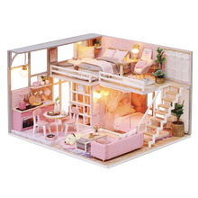 Wooden miniature home kit with pink interior furniture and LED lighting for cozy dollhouse scenes.