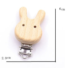 Wooden rabbit shaped pacifier clip with measurements, a beech teether holder for newborn soothing and gift sets.