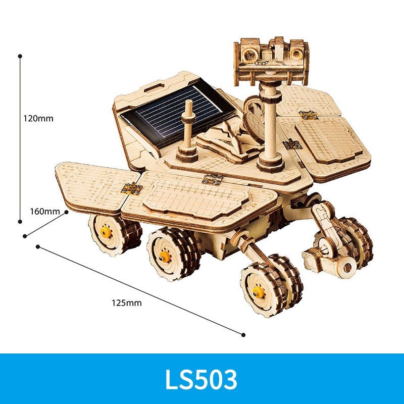 Wooden space rover with solar panel built from the 3D gear puzzle kit for STEM learning about mechanics and space.