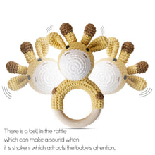Wooden Teether with BPA-free rattle and crochet cover for gentle gum relief and quiet play in the pram or cot.