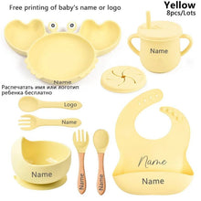 Yellow baby crab feeding bundle with bowl, cup, and bib, covering weaning essentials from first spoons onward.