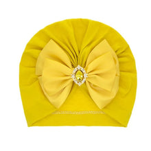 Shiny Rhinestone Bowknot Baby Turban in yellow with decorative center for cheerful daily wear.