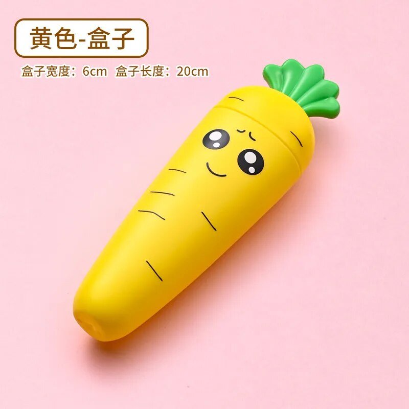 Yellow carrot-shaped baby tableware container with a green top shown from another angle.