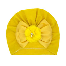 Yellow flower and pearl baby turban cap for gifting, celebrations, and cute everyday baby headwear.