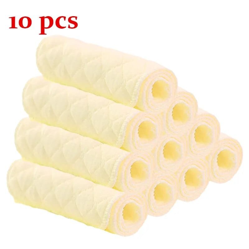 Yellow microfiber baby diaper liners in a 10-piece value pack for daily nappy changes and reusable diaper care.