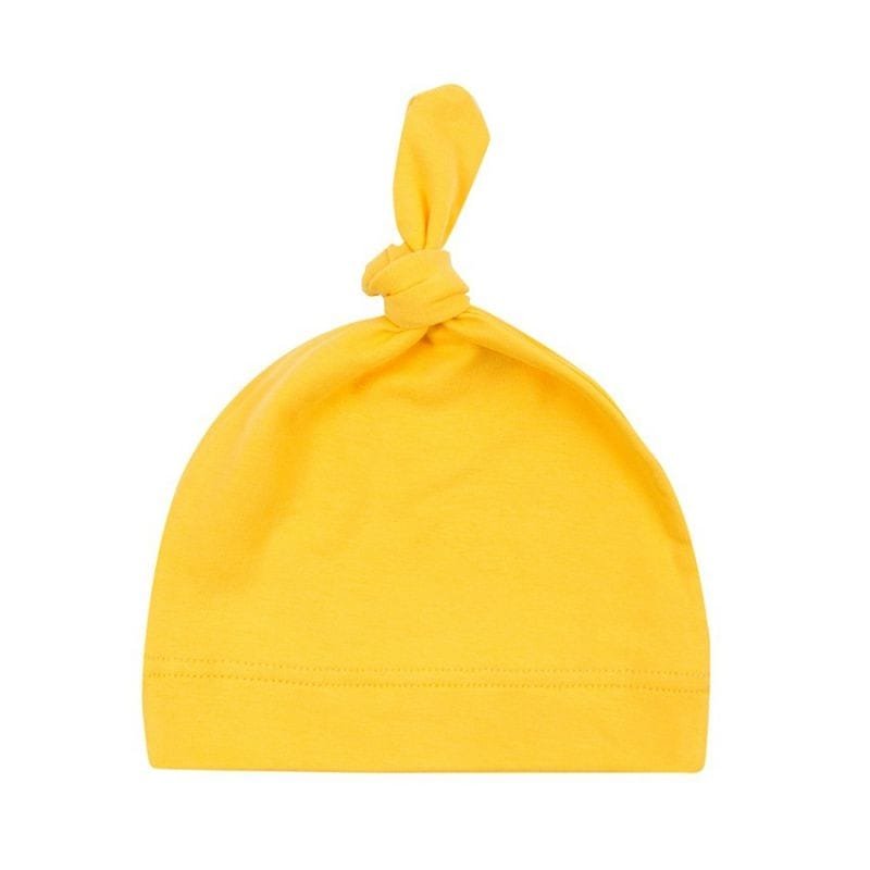 Yellow newborn cotton knot beanie as a bright baby sleep cap for naps, outings, and photo sessions.