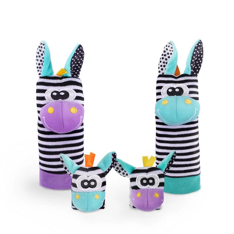 Zebra-themed baby rattle and foot finder socks set as a newborn sensory toy for cot time and playmat sessions.