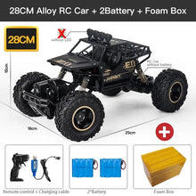 ZWN RC off-road truck with big wheels laid out with remote and batteries, a gift-ready toy set for young racers.